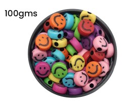 Cuentas plasticas pastilla multicolor carita negra